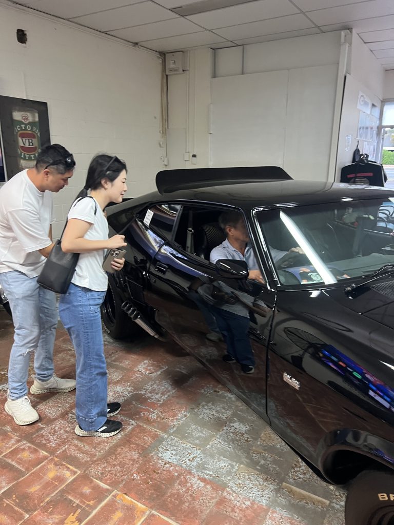 Visitors checking out the Interceptor at the Muscle Car Museum