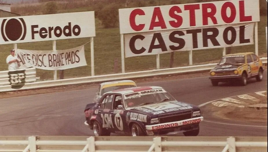 Holden Torana number 17 of Stirling Moss and Jack Brabham racing at Bathurst in 1976, Castrol and Ferodo signs behind